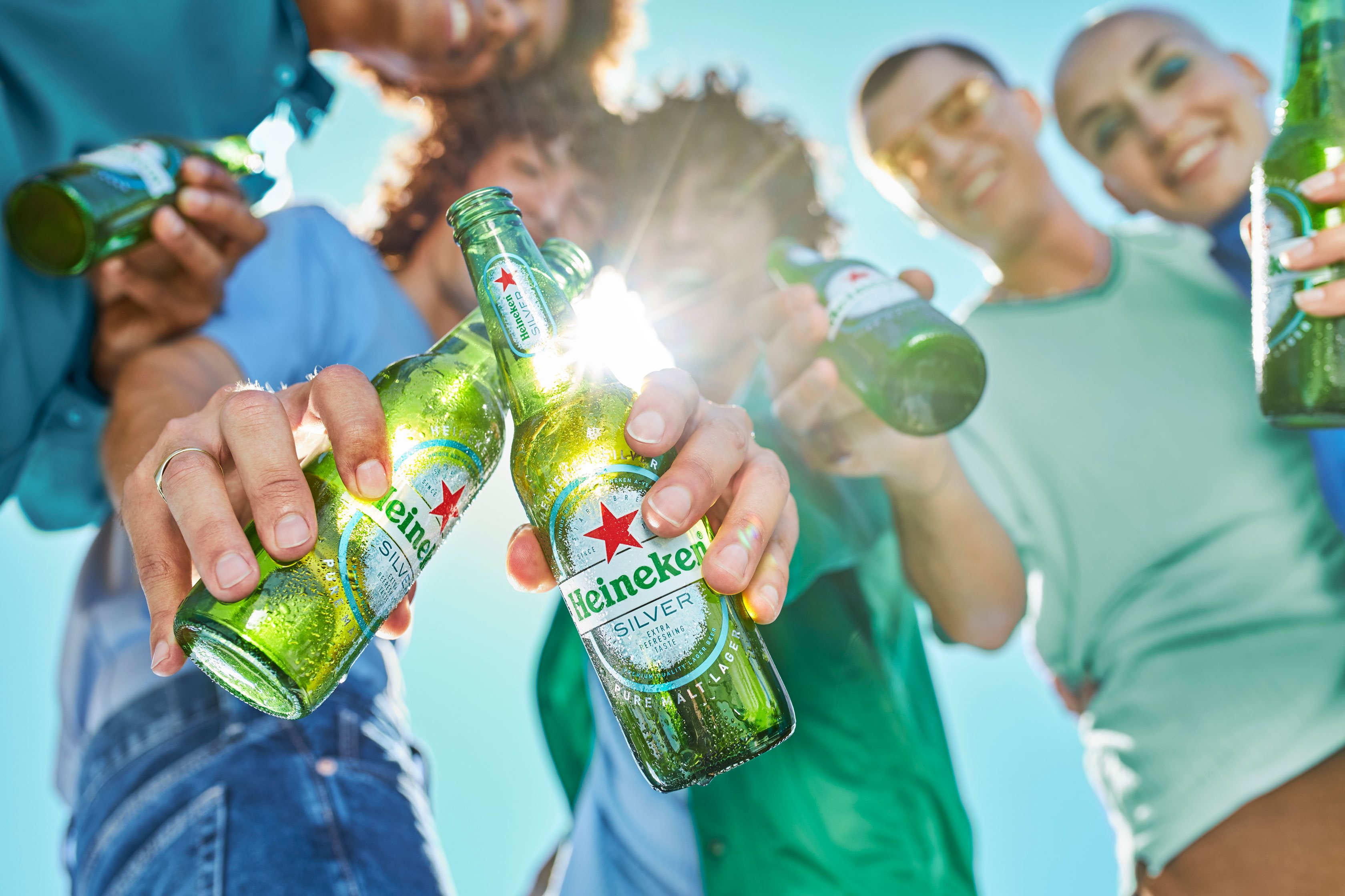 Heineken Silver Banner People Holding Bottles 3360X2240px