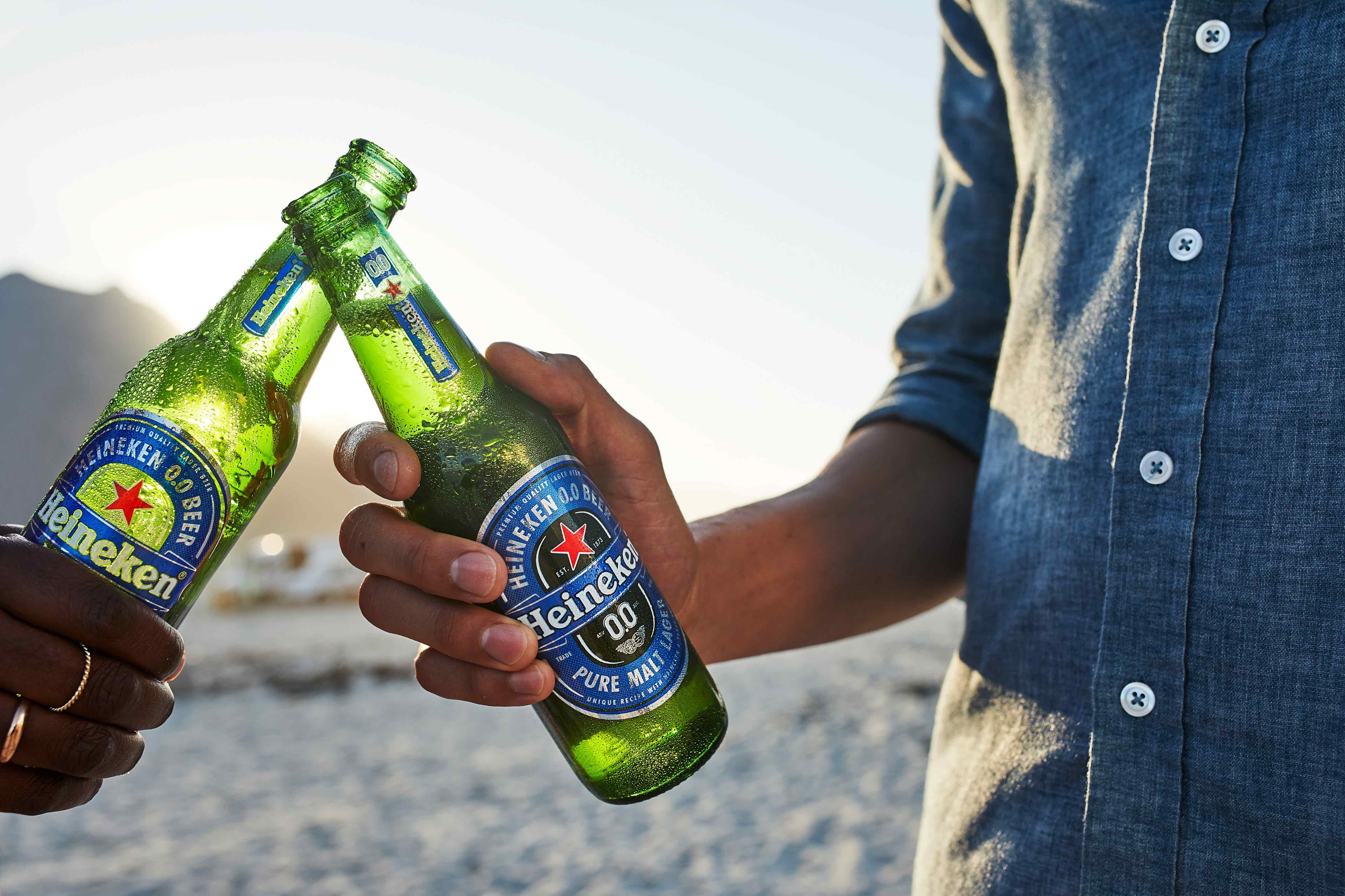 Heineken 00 two bottles at the beach