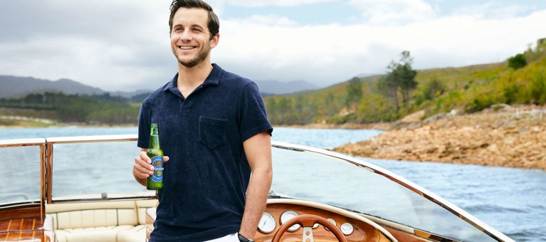 Heineken beer 0.0 zero man at boat